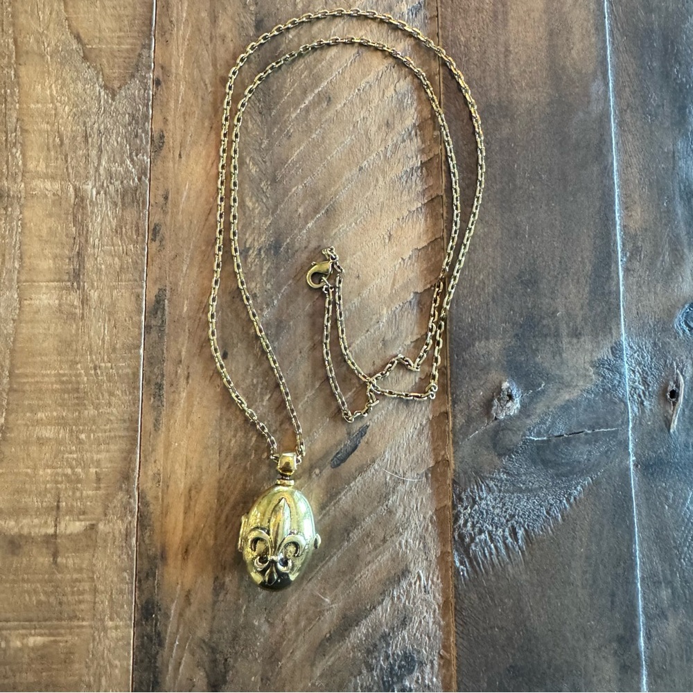 Jewel Kade Fleur-de-lis locket necklace.